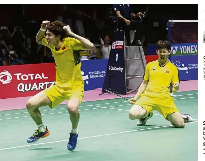  ??  ?? Sheer joy: China’s Li Junhui (left) and Liu Yuchen (right) react after beating Japan’s Keigo Sonoda-Yuta Watanabe 17-21, 21-19; 22-20 to give China the winning point in their 3-1 victory in the Thomas Cup final. — AP