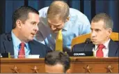  ?? Saul Loeb AFP/Getty Images ?? REP. DEVIN Nunes, Rep. Jim Jordan and counsel Stephen Castor at the first impeachmen­t hearing.