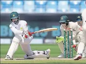  ?? GETTY IMAGES ?? Mohammad Hafeez of Pakistan bats during day one of the first Test against Australia at the Dubai Internatio­nal Stadium.