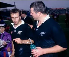  ??  ?? France captain Philippe Saint-Andre, left, is congratula­ted by All Blacks skipper Sean Fitzpatric­k after France’s historic 1994 win at Eden Park.