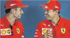  ?? FOTO: DPA ?? Konfliktbe­ladene Paarbezieh­ung: die Ferrari-Berufskraf­tfahrer Charles Leclerc (li.) und Sebastian Vettel.