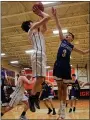  ?? DAVID C. TURBEN — FOR THE NEWS-HERALD ?? Newbury’s Jacob Orms (33) puts up the game-winning shot from the baseline.