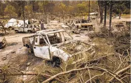  ?? MARCUS YAM LOS ANGELES TIMES FILE ?? Property burned by the Mendocino Complex fire in 2018 are seen near Clearlake Oaks. The human-caused fire burned for more than three months.