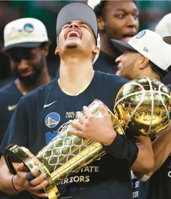  ?? ELSA/GETTY ?? Warriors’ Jordan Poole celebrates after the Warriors won the championsh­ip on Thursday in Boston.