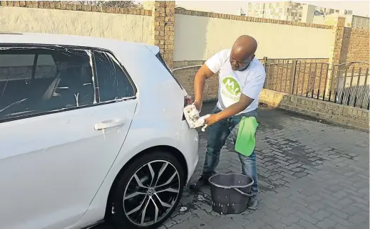  ?? /SUPPLIED ?? Kevin Dladla of Midrand operates a car wash and and a car wash app.