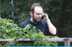  ?? AFP ?? SMITHS FALLS: File photo shows freed Canadian hostage Joshua Boyle talking on the phone outside the Boyle family home in Smiths Falls, Ontario, Canada.—