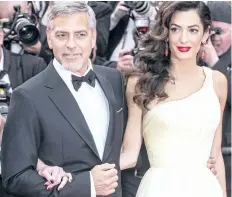  ??  ?? George Clooney and his wife Amal.