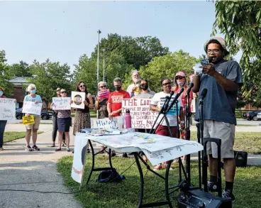  ??  ?? CHECK YOUR PRIVILEGE Supporters of critical race theory gather before a Jefferson County public school board meeting in Louisville, Kentucky in July 2021.