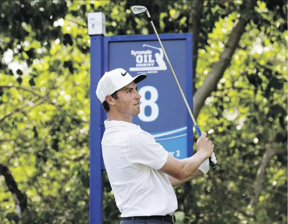  ?? DAVID BLOOM ?? Ben Griffin of North Carolina, who won his first Mackenzie PGA Canadian Tour title in Thunder Bay a couple of weeks ago, hits a tee shot en route to shooting 68 in Thursday’s opening round of the Syncrude Oil Country Championsh­ip at the Petroleum Golf...