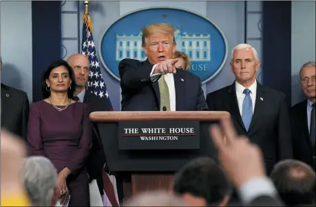  ?? EVAN VUCCI — THE ASSOCIATED PRESS ?? President Donald Trump speaks during a press briefing with the coronaviru­s task force, at the White House March 17in Washington.