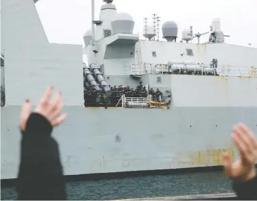  ?? CHAD HIPOLITO/THE CANADIAN PRESS ?? Family and friends welcome home HMCS Ottawa in December 2019. Newly released documents reveal the discussion­s between diplomatic and defence officials around the Ottawa's passage through the Taiwan Strait last year.