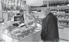  ??  ?? Left, Canucks, Kiwis and a Chicagolan­der bond over beer. Right, Jamon iberico, olive oil, tempranill­o wine and thou (for lunch).