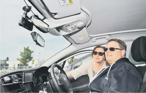  ??  ?? Driving instructor­s Steve Edwards and Lynsey Dobney want to start a campaign to introduce dashcams.