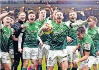  ?? ?? HAVING A BALL Hibs party after Boyle’s hat-trick heroics