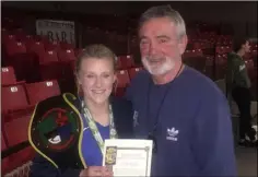  ??  ?? Nicole Moorehouse of Clonard Boxing Club with her coach, TomHayes, after winning the Irish Under-22 57 kg. title at the National Stadium.