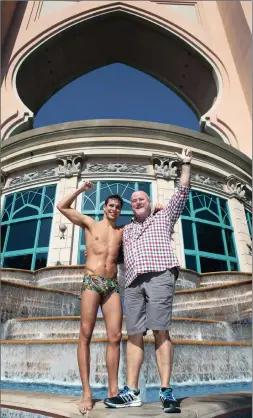  ??  ?? ROARING: An excited Chad and Bert le Clos at the swimmer’s surf wear presentati­on.