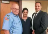  ?? EVAN BRANDT — DIGITAL FIRST MEDIA ?? From left, Pottstown Police Chief Rick Drumheller and Mayor Stephanie Henrick congratula­te Michael Markovich after being named interim Pottstown police chief June 5.