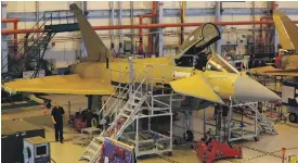  ?? Reuters ?? A Eurofighte­r Typhoon production line at BAE Systems