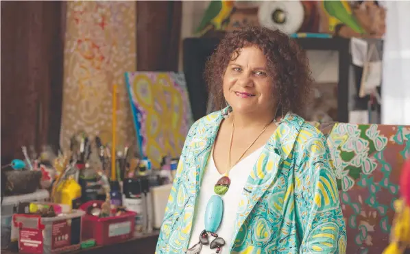  ?? ?? Yarrabah artist Elverina Johnson's work features on a clothing range sold nationally by plus-size fashion label Taking Shape. Picture: Veronica Sagredo