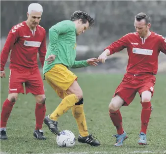  ??  ?? Wearmouth CW (red) take on Consett in last week’s cup clash. Pictures by Tim Richardson