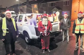  ??  ?? In Highburton with Martin Ward, Santa and helpers