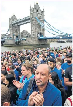  ??  ?? GRIEF: Thousands mourn the London Bridge victims