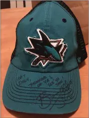  ?? PHOTO COURTESY OF RYAN BROWN ?? The San Jose Sharks sent a hat signed by players Brent Burns and Brenden Dillon to a young fan who lost his Sharks hat when his family’s home was destroyed in the Camp Fire in November.