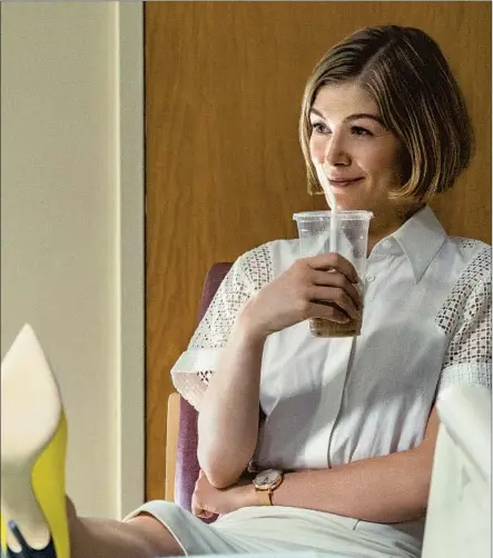  ?? Seacia Pavao Netf lix ?? ROSAMUND PIKE, who earned a Golden Globe nod for her efforts, is picture-perfect hustler Marla in the Netflix film “I Care a Lot.”