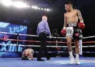  ?? Rank Inc/Top Rank/Getty Images ?? Jesse Rodriguez looks on after knocking down Saúl Juárez at the MGM Grand in December 2020. Photograph: Mikey Williams/Top