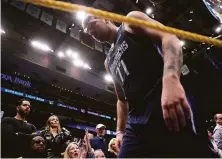  ?? Scott Strazzante / The Chronicle ?? Dallas forward Luka Doncic heads to the locker room after the first half of the Warriors’ 109-100 win in Game 3.