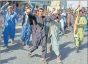  ?? AFP ?? People protest after the Taliban reportedly asked them to leave their homes built on state-owned land in Kandahar.