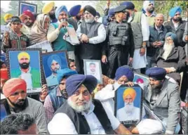  ?? KESHAV SINGH/HT ?? SAD president Sukhbir Singh Badal and former CM Parkash Singh Badal along with party workers sitting on a dharna near the Punjab assembly on Tuesday.