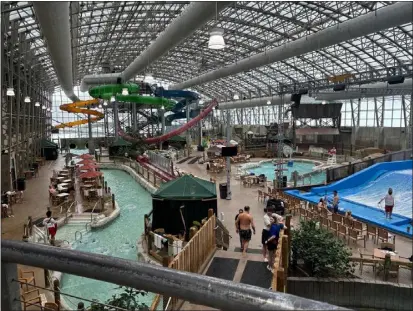  ?? PHOTO BY MOIRA MCCARTHY ?? Skiing not your thing? Jay Peak’s waterpark serves up lots of indoor, summer-like fun.