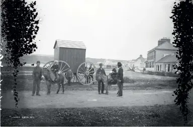  ??  ?? Kilkee in Co. Clare, M. Cahill Bathing Machines, from the National Library of Ireland Flickr Collection