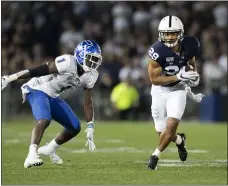  ?? BARRY REEGER - THE ASSOCIATED PRESS ?? Penn State cornerback John Reid, a graduate of St. Joseph’s Prep, returns an intercepti­on for a touchdown against Buffalo. Reid was taken by the Houston Texans in the fourth round of the NFL Draft on Saturday.