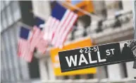  ?? MARK LENNIHAN / THE ASSOCIATED PRESS FILES ?? Wall Street rallied this week with the announceme­nt of a
stimulus package but plenty of volatility remains.