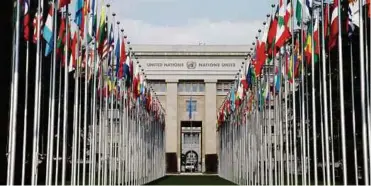  ??  ?? Flags of member states are pictured outside the United Nations in Geneva on Feb 27.