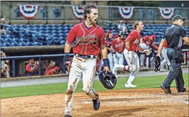  ?? Mills Fitzner ?? Rome’s Drew Campbell celebrates after coming home to score the winning run in the 10th inning on Wednesday night.