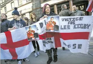  ?? Oli Scarff Getty Images ?? A CROWD rallies in London in 2014 for soldier Lee Rigby, who was killed by Islamic extremists. After the crime, analysts assessed Twitter data based on race, ethnicity and religion.