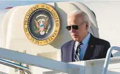  ?? AP ?? President Biden boards Air Force One on Friday headed for Delaware. On Saturday, he returned to Washington to deal with attack on Israel.