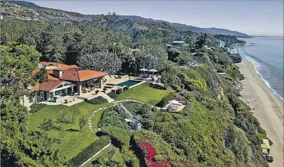  ?? Photograph­s from Realtor.com ?? THE OCEANFRONT estate once owned by media mogul Barry Diller spans 3 acres with multiple homes and high-end amenities.