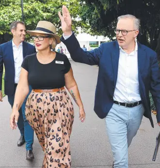  ?? ?? Labor leader Anthony Albanese out and about with Labor candidate for Leichhardt Elida Faith in Cairns. Picture: Toby Zerna