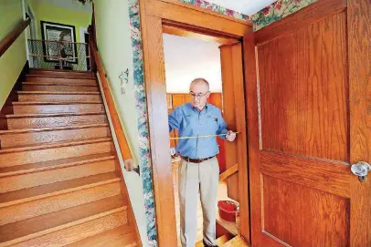  ?? [PHOTO BY JIM BECKEL, THE OKLAHOMAN] ?? Jack Werner, owner of A to Z Inspection­s &amp; Training, recently recognized as one of just 12 Master Instructor­s in the National Associatio­n of Home Builders, talks about aging-in-place modificati­ons at his home near NW 36 and Classen Boulevard.