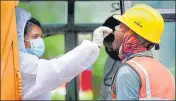  ?? PTI ?? A health worker collects swab sample from a migrant worker for Covid-19 test, in Chennai on October 19.