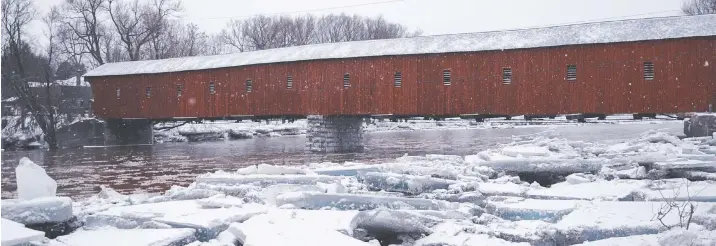  ?? [FAISAL ALI / THE OBSERVER] ?? A quick thaw at the end of last week saw ice on the Grand River system break up, causing a few jams in the usual spots such as the West Montrose covered bridge, but no flooding was reported.