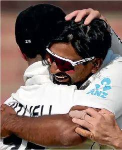  ?? AP ?? Congratula­tions time for Ish Sodhi after he tok the wicket of Imam-ul-Haq during the fifth day of the first test in Karachi.