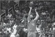  ?? ASSOCIATED PRESS ?? PHOENIX SUNS CENTER Aron Baynes (46) shoots a 3-pointer over Portland Trail Blazers guard Damian Lillard (0) during the second half Friday’s game in Phoenix. The Suns won 127-117.