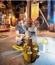  ??  ?? A young visitor getting hands-on at the Petrosains Oil Platform – the only one in the city.