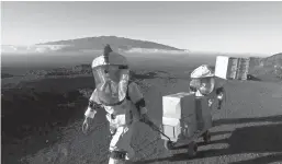  ?? University of Hawaii via Associated Press ?? n TOP: In this undated 2017 photo, crew members of Mission V walk uphill with a cart next to the university’s facility Hawaii Space Exploratio­n Analog and Simulation (HI-SEAS) at the Mauna Loa volcano, Big Island, Hawaii. After eight months of living...