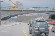  ?? STAFF FILE PHOTO ?? Traffic passes beneath the Market Street Bridge after Riverfront Parkway.